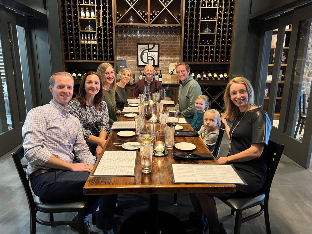 Family around a table in a restaurant.