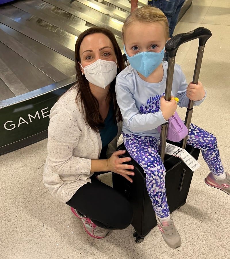 Daughter and Granddaughter arrive in airport.