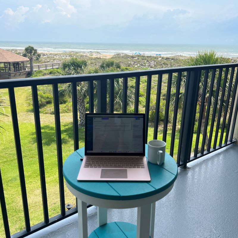 Laptop computer on a balcony table in Florida.